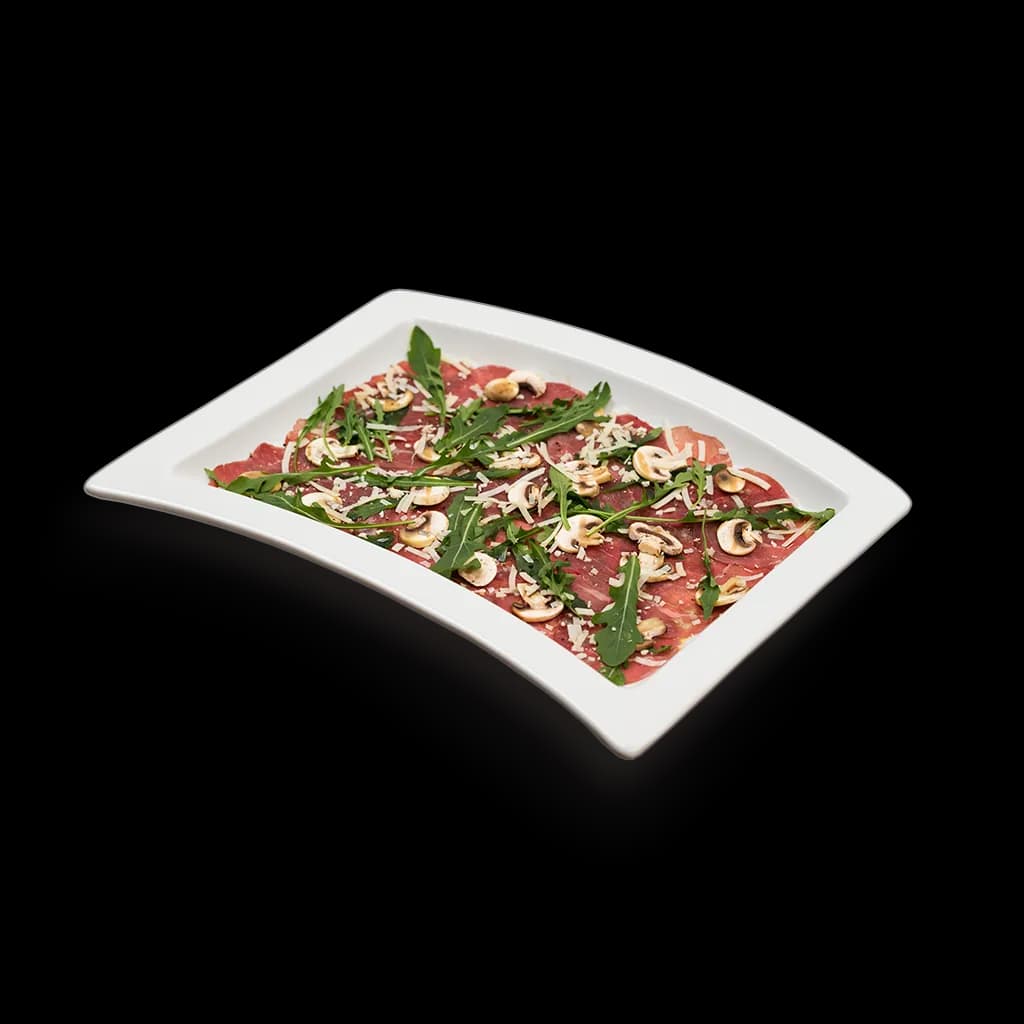 Platte Rindercarpaccio mit Rucola, Champignons und Parmesan