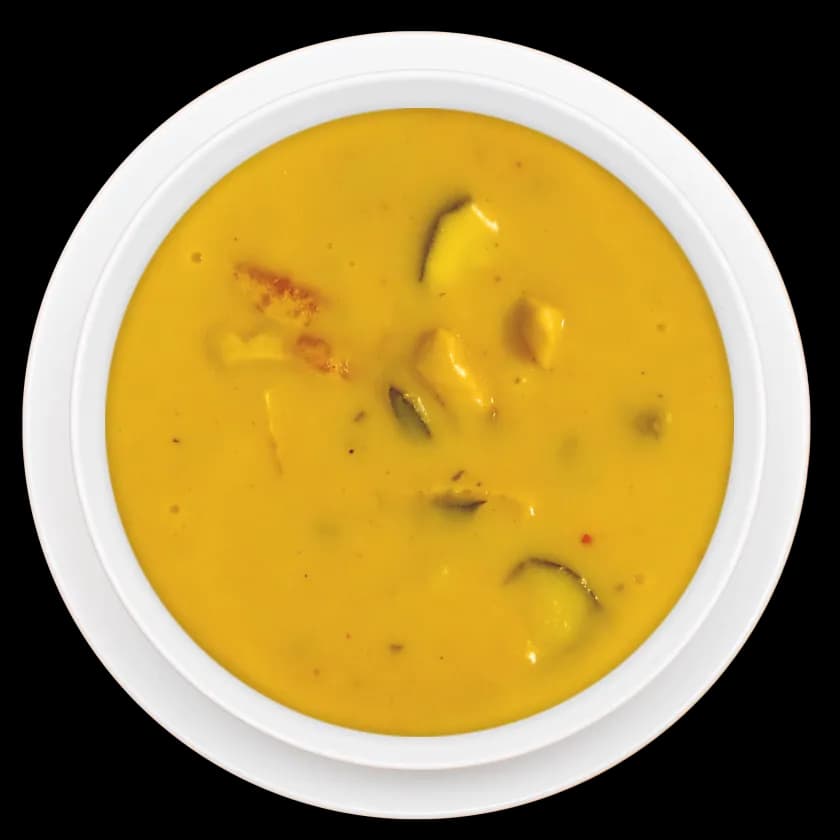 Curry mit Fleischeinlage in weißer Schale