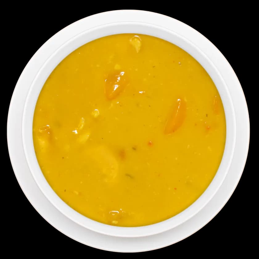 Veganes Curry mit Gemüse in weißer Schale