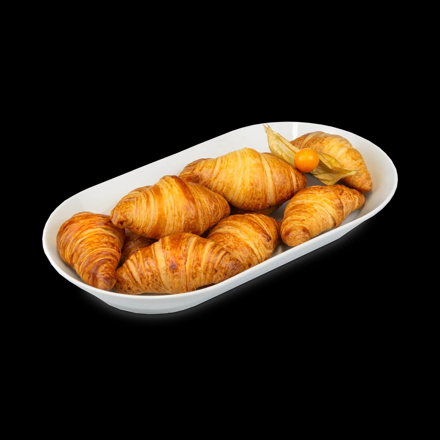 Mini-Buttercroissants auf weißer Platte
